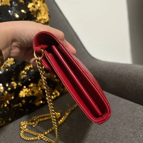 SOLD

Yves Saint Laurent Red Chevron Leather Wallet on Chain - Picture 6 of 13
